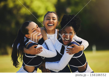 Teamwork, hug or portrait of cheerleader with people outdoor in training or sports event together. Celebrate, smile or proud girl by a happy cheer squad group on field for support, winning or fitness Teamwork, hug or portrait of cheerleader with people outdoor in training or sports event together. Celebrate, smile or proud girl by a happy cheer squad group on field for support, winning or fitness 138186552