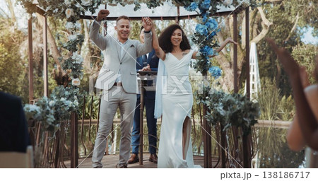 Couple, wedding and celebrating with cheer to guest at ceremony or commitment with gratitude in garden. Happy partnership, marriage or friends with success in romance for union, smile and husband 138186717