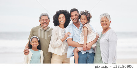 Portrait, happy and big family at beach on vacation, holiday or travel outdoor in summer. Parents, grandparents and kids at ocean for care, children bonding together and smile for connection at sea Portrait, happy and big family at beach on vacation, holiday or travel outdoor in summer. Parents, grandparents and kids at ocean for care, children bonding together and smile for connection at sea 138186900