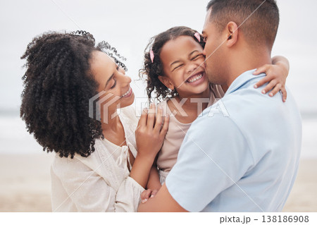 Beach, hug and mother with father, girl and love with vacation, weekend break and happiness. Family, mama and dad with child, embrace or cheerful with seaside holiday, joyful and travel with bonding 138186908