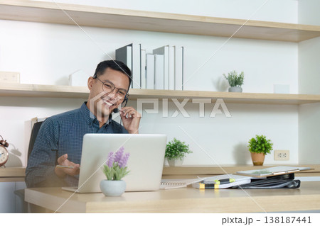 Customer service agent communicating with clients Customer service agent communicating with clients 138187441