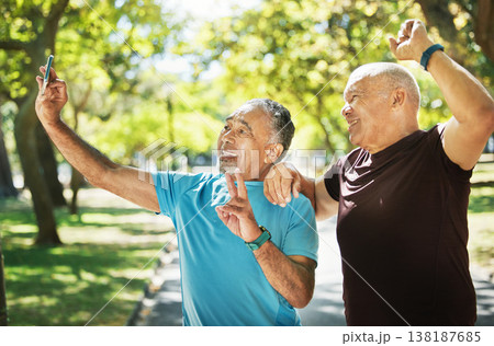Friends, men and taking a selfie after exercise in park with peace sign, smile and together for fitness. Mature, people and happy in wellness, workout or cardio in retirement for walk, bond or health Friends, men and taking a selfie after exercise in park with peace sign, smile and together for fitness. Mature, people and happy in wellness, workout or cardio in retirement for walk, bond or health 138187685