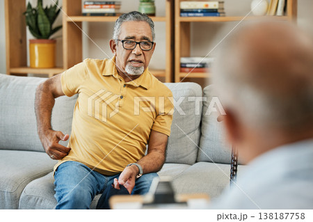 Doctor, consultation and senior man on sofa with walking stick or discussion of pain in physical therapy with checklist. Therapist, consulting and talking elderly patient on couch in rehabilitation 138187758