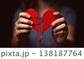 Broken heart in the hands - divorce concept. photo with red heart. 138187764