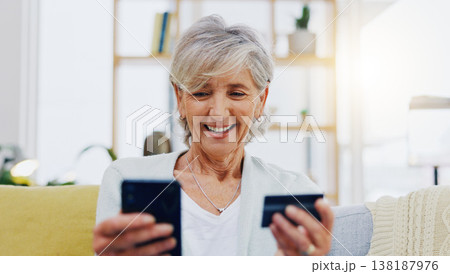 Happy senior woman, online shopping and delivery on phone, credit card and signature in logistics for package at home. Excited elderly female in ecommerce, shipping transaction or parcel for purchase Happy senior woman, online shopping and delivery on phone, credit card and signature in logistics for package at home. Excited elderly female in ecommerce, shipping transaction or parcel for purchase 138187976