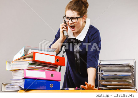 Angry bossy businesswoman phone talking Angry bossy businesswoman phone talking 138188345