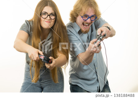 Gaming couple playing games Gaming couple playing games 138188488