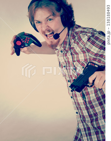Gamer man shooting from gun 138188493