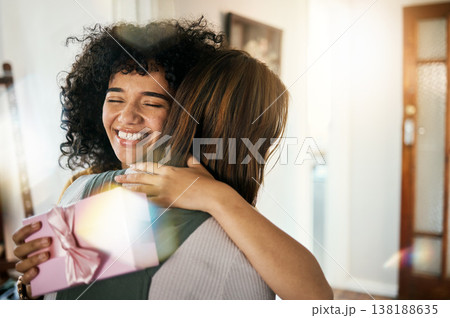 Excited, hug and present box for birthday of girl friends and smile with gratitude together. Surprise, gift and happy female person at home with giving and celebration, congratulations and package Excited, hug and present box for birthday of girl friends and smile with gratitude together. Surprise, gift and happy female person at home with giving and celebration, congratulations and package 138188635