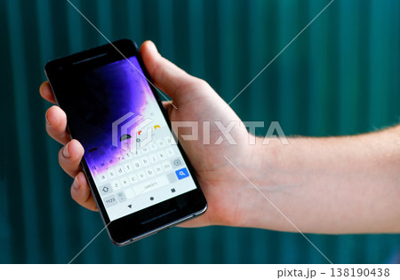 Broken smartphone with purple ink spots on AMOLED display. Damaged mobile phone screen after impact or pressure. Defective electronic device requiring repair Broken smartphone with purple ink spots on AMOLED display. Damaged mobile phone screen after impact or pressure. Defective electronic device requiring repair 138190438