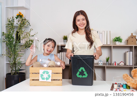 Family recycling activity with mother and daughter 138190456