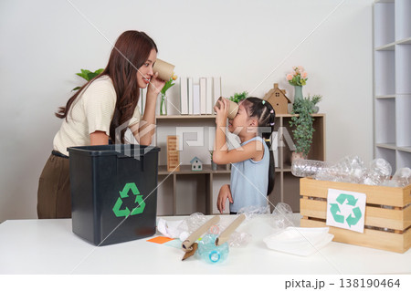 Family recycling activity with mother and daughter Family recycling activity with mother and daughter 138190464