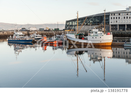 Fishing boats and small vessels rest at a dock, Trondheim Fishing boats and small vessels rest at a dock, Trondheim 138191778