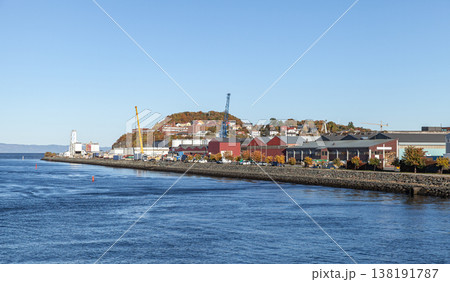 Trondheim industrial harbor with warehouses and cranes Trondheim industrial harbor with warehouses and cranes 138191787
