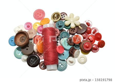 A collection of buttons of various shapes, colors and materials. A collection of buttons of various shapes, colors and materials. 138191798