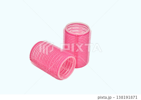 Pink Velcro hair rollers. 138191871
