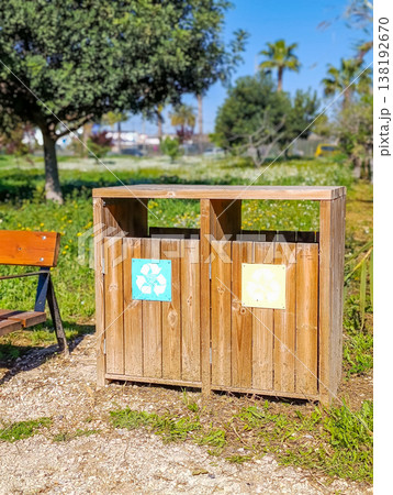 Park Bench with Recycling Bins for Paper and Plastic 138192670
