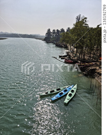 a scenic view of the colorful kayaks on the sea 138192769