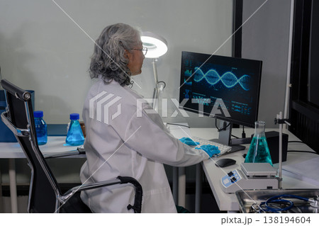 Medical Research Laboratory: Two scientists working, using digital tablets, analyzing samples, talking, developing biotechnology. 138194604