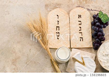 Shavuot holiday symbols with tablets and dairy Shavuot holiday symbols with tablets and dairy 138196603
