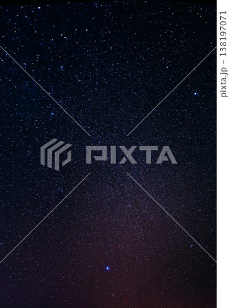 Beautiful night sky filled with stars and soft purple galaxy glow Beautiful night sky filled with stars and soft purple galaxy glow 138197071