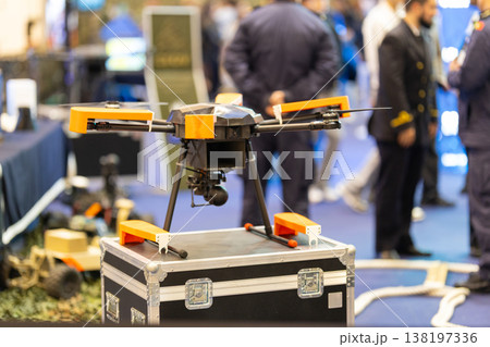 Military drone with camera at defense exhibition event Military drone with camera at defense exhibition event 138197336