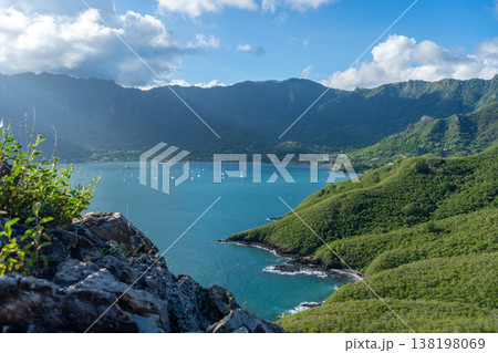 Taiohae Bay and town with anchored sailboats in Nuku Hiva, Marquesas Islands, French Polynesia Taiohae Bay and town with anchored sailboats in Nuku Hiva, Marquesas Islands, French Polynesia 138198069