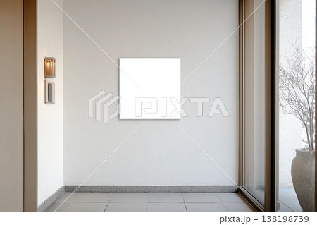 Empty white blank square sign frame mounted on the wall near room door, beige color, at the hotel. Mockup floor sign or signage for information. 138198739