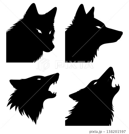 Four distinct wolf head silhouettes in various poses with glowing eyes on white background Four distinct wolf head silhouettes in various poses with glowing eyes on white background 138201597