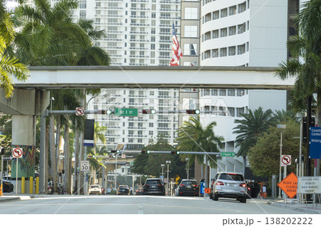 Driving cars on city street in Miami, Florida 138202222