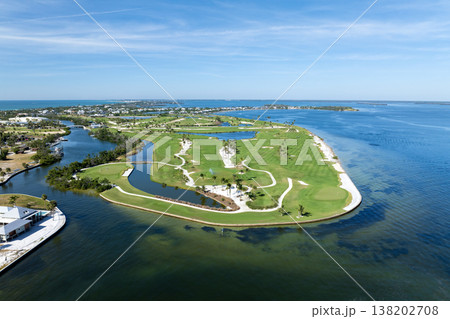 Big golf course field with green grass in Boca Grande, small town on Gasparilla Island in southwest Florida Big golf course field with green grass in Boca Grande, small town on Gasparilla Island in southwest Florida 138202708