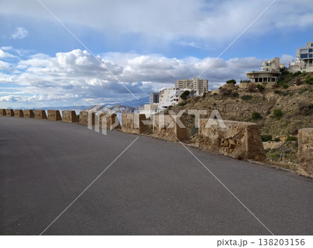 Scenic property situated on hillside overlooking bay, Cluster of houses on hill with sea view background Scenic property situated on hillside overlooking bay, Cluster of houses on hill with sea view background 138203156