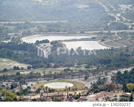 Aerial view of farmland and water structures, Survey of irrigation basins amidst agricultural land Aerial view of farmland and water structures, Survey of irrigation basins amidst agricultural land 138203237