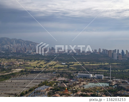 Serene seaside golf course view, Peaceful golf course overlooking coastal city and ocean horizon Serene seaside golf course view, Peaceful golf course overlooking coastal city and ocean horizon 138203253