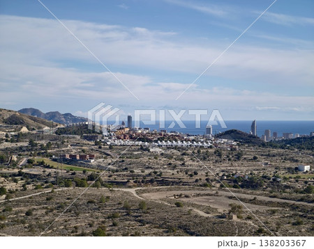 Seaside cityscape visuals, Scenic seashore skyline with modern glass buildings and sunny weather Seaside cityscape visuals, Scenic seashore skyline with modern glass buildings and sunny weather 138203367