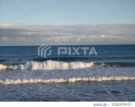 Peaceful marine landscape illustrating tranquil waters and undulating wave sequences in perfect harmony 138203415