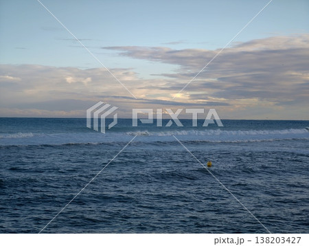Single buoy dances on rough sea surface, Solitary marker amidst stormy waters and atmospheric phenomena 138203427