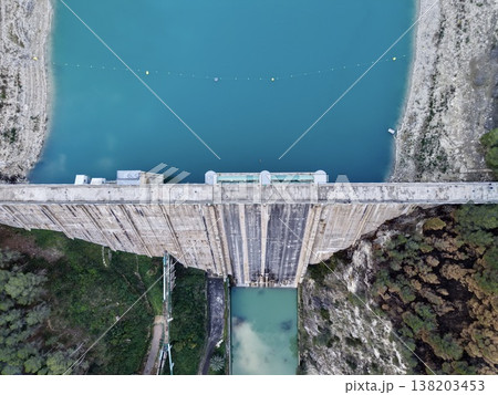 Scenic water panorama, Vast water body with hills, Overhead view of dam and surrounding hills Scenic water panorama, Vast water body with hills, Overhead view of dam and surrounding hills 138203453