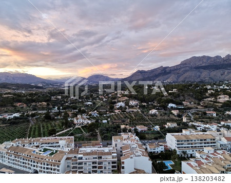 Scenic coastal hillside properties view, Aerial shot showcasing elegant villa surroundings Scenic coastal hillside properties view, Aerial shot showcasing elegant villa surroundings 138203482