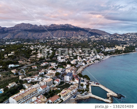 Coastal landscape with serene waters, Aerial shot highlighting gentle waves and tranquil coastal scenery Coastal landscape with serene waters, Aerial shot highlighting gentle waves and tranquil coastal scenery 138203489