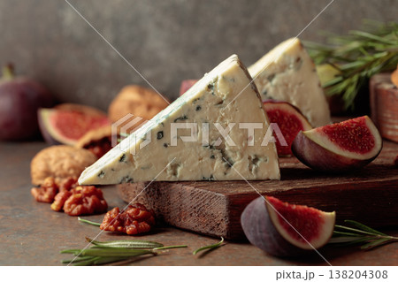Blue cheese with fresh figs, rosemary, and walnuts. 138204308