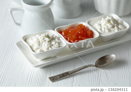 Cottage cheese with quince jam. 138204311