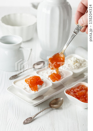 Cottage cheese with quince jam. Cottage cheese with quince jam. 138204314