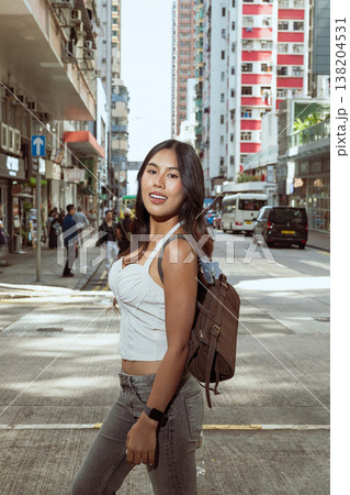 Asian Woman Smiling on Kennedy Town Street Hong Kong Asian Woman Smiling on Kennedy Town Street Hong Kong 138204531
