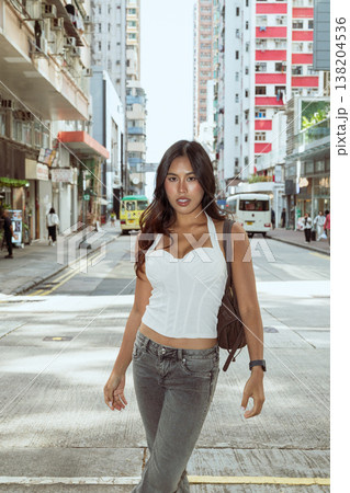 Asian Woman Smiling on Kennedy Town Street Hong Kong Asian Woman Smiling on Kennedy Town Street Hong Kong 138204536