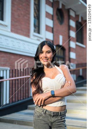 Asian Woman Smiling at Tai Kwun Hong Kong Asian Woman Smiling at Tai Kwun Hong Kong 138204549