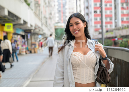 Asian Woman Walking on Hong Kong Street 138204662