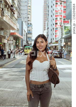 Asian Woman Smiling on Kennedy Town Street Hong Kong Asian Woman Smiling on Kennedy Town Street Hong Kong 138204664