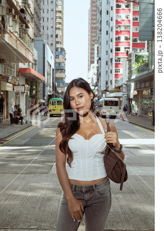 Asian Woman Smiling on Kennedy Town Street Hong Kong Asian Woman Smiling on Kennedy Town Street Hong Kong 138204666