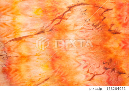 abstract pattern on silk fabric texture in yellow and brown tones abstract pattern on silk fabric texture in yellow and brown tones 138204931